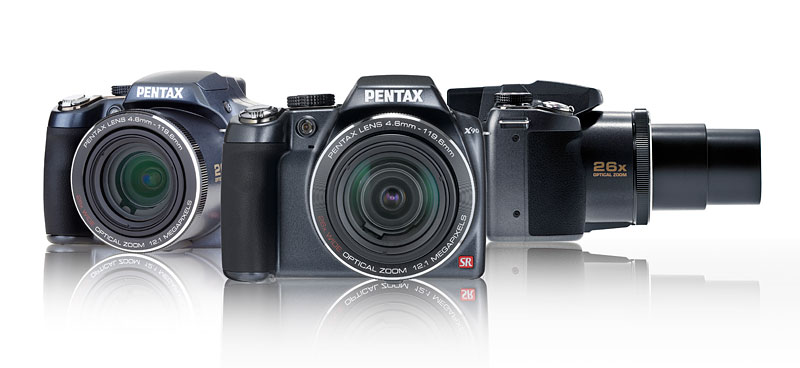 vpentax_optio_x90_o Pentax Optio X90 má 26 násobný optický zoom s nejdelším ohniskem 676 mm při světelnosti F5. Při takovémto ohnisku ani nezkoušejte fotit z ruky