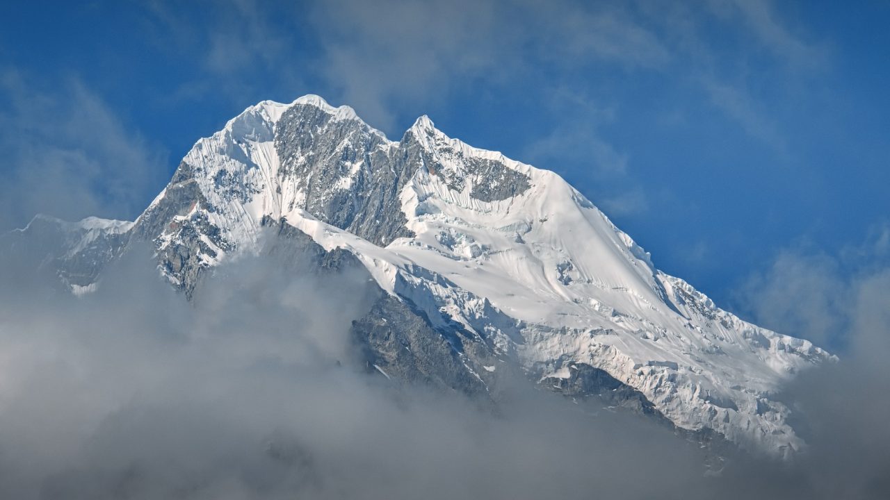 Čína, Východní Tibet, Posvátná hora Miňa Gangkar 7556 m n.m. 
